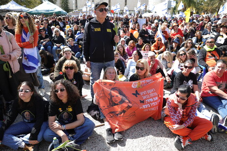 People gather in Tel Aviv to watch Bibas family funeral