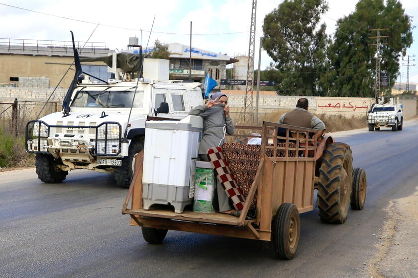 Residents leave southern Lebanon's Wazzani village after evacuation leaflets dropped over