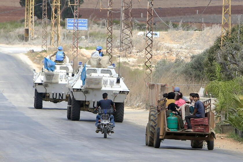 Residents leave southern Lebanon's Wazzani village after evacuation leaflets dropped over