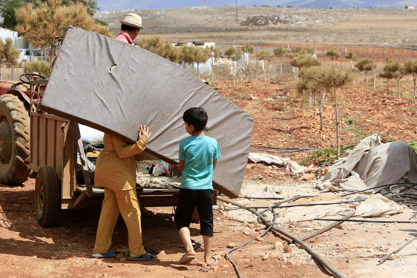 Residents leave southern Lebanon's Wazzani village after evacuation leaflets dropped over