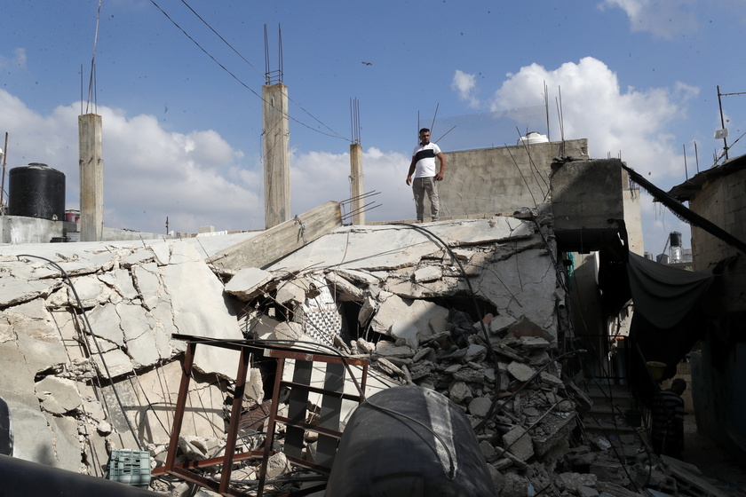 Palestinians inspect the damage after 9-day Israeli military operation in West Bank's Jenin