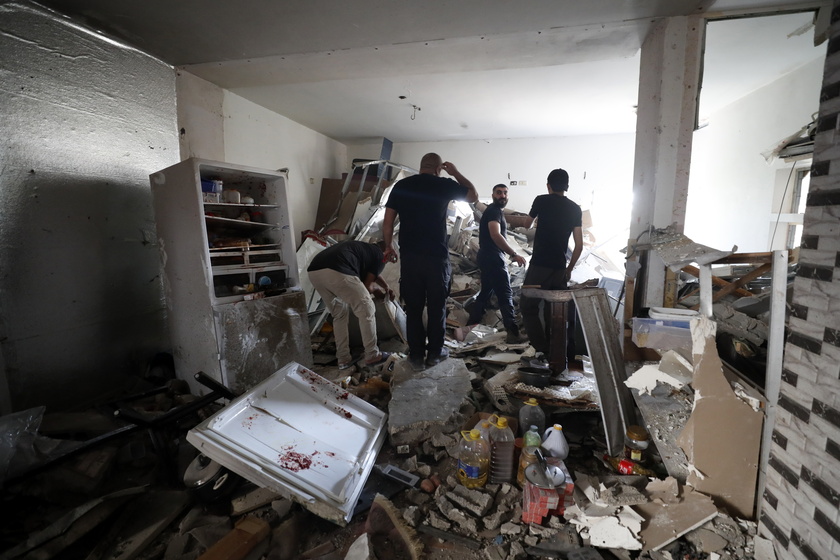 Palestinians inspect the damage after 9-day Israeli military operation in West Bank's Jenin