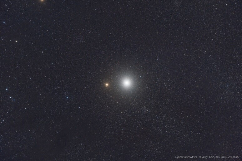 Marte e Giove su uno sfondo di stelle e nubi di polveri galattiche (foto: Gianluca Masi) - RIPRODUZIONE RISERVATA